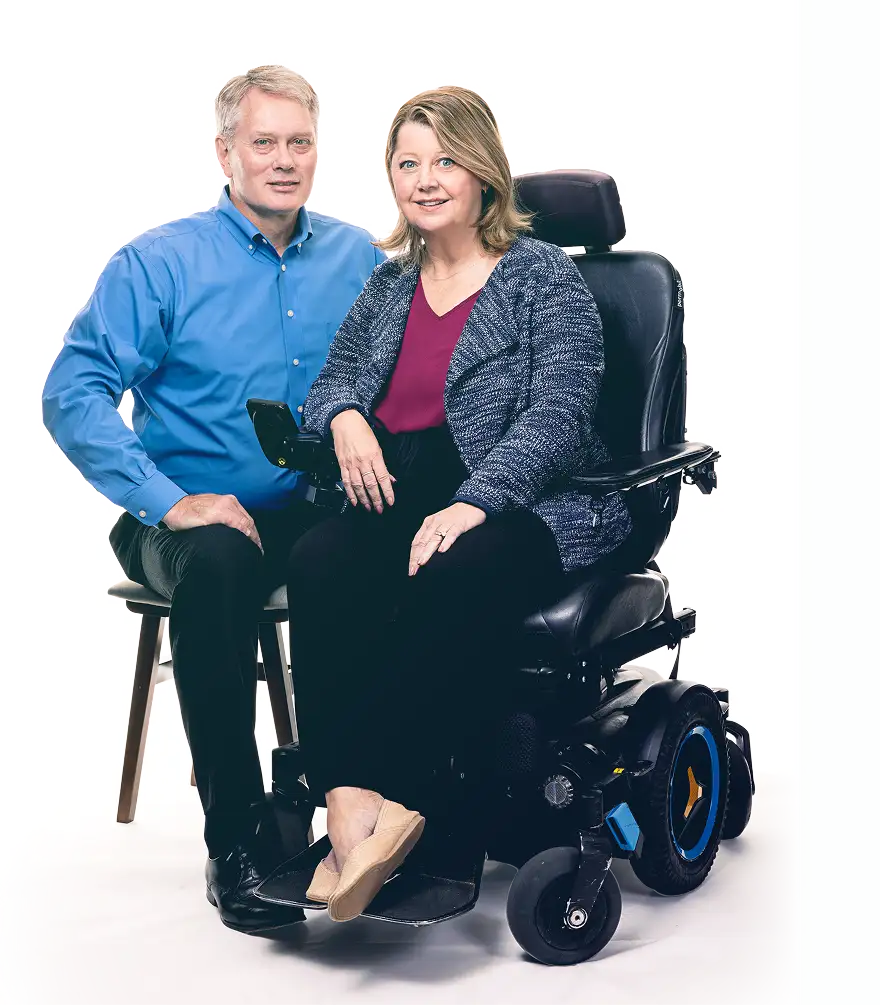 Person using a wheelchair representing mobility challenges in LGMD2I/R9